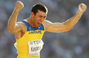 Oleksiy Kasyanov of Ukraine celebrates as he competes in the pole vault event in the men's decathlon during the world athletics championships at the Olympic stadium in Berlin August 20, 2009. REUTERS/Phil Noble (GERMANY)